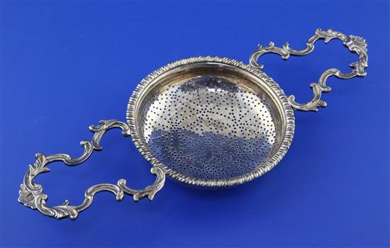 An early George III silver lemon strainer by Samuel Herbert & Co, 4 oz.